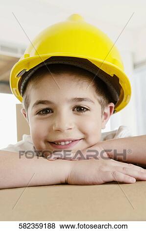 Close-up of a boy smiling View Large Photo Image Stock Photo - Close-up of a boy smiling. Fotosearch