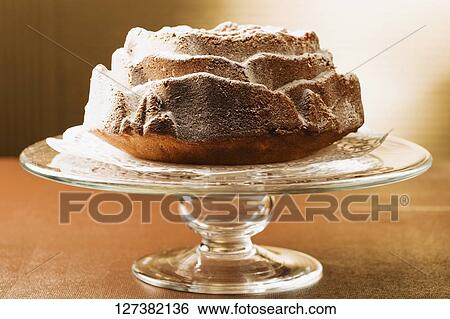 Close-up of a cake in a tray View Large Photo Image Stock Photograph - Close-up of a cake in a tray. Fotosearch