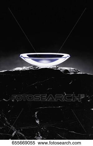 Close-up of a contact lens on a rock View Large Photo Image Stock Photography - Close-up of a contact lens on a rock. Fotosearch