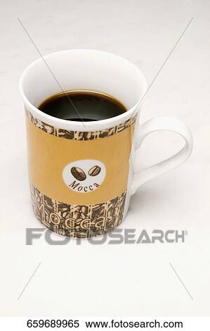 Stock Photography - Close-up of a cup of black coffee. Fotosearch