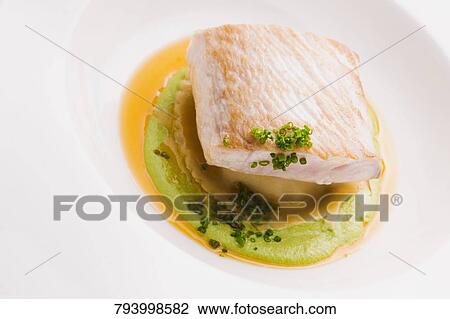 Close-up of a food in a plate View Large Photo Image Stock Image - Close-up of a food in a plate. Fotosearch