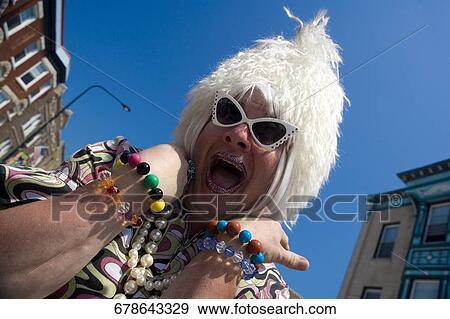 Close-up of a gay man shouting View Large Photo Image Stock Photo - Close-up of a gay man shouting. Fotosearch