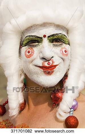 Close-up of a gay man wearing a wig View Large Photo Image Stock Image - Close-up of a gay man wearing a wig. Fotosearch