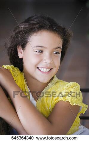 Close-up of a girl day dreaming View Large Photo Image Stock Image - Close-up of a girl day dreaming. Fotosearch