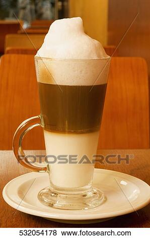 Close-up of a glass of cappuccino View Large Photo Image Stock Photo - Close-up of a glass of cappuccino. Fotosearch