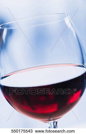 Close-up of a glass of red wine View Large Photo Image Stock Image - Close-up of a glass of red wine. Fotosearch