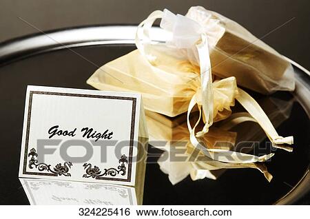 Close-up of a good night note in a plate View Large Photo Image Stock Photograph - Close-up of a good night note in a plate. Fotosearch