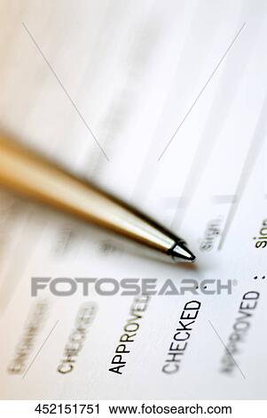 Close-up of a pen on a financial report View Large Photo Image Stock Image - Close-up of a pen on a financial report. Fotosearch