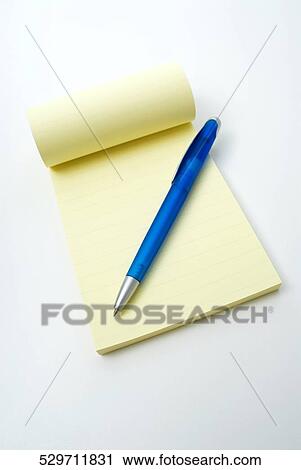 Close-up of a pen on a notepad View Large Photo Image Stock Image - Close-up of a pen on a notepad. Fotosearch
