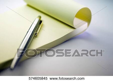 Close-up of a pen on a notepad View Large Photo Image Stock Photography - Close-up of a pen on a notepad. Fotosearch