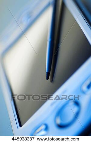 Close-up of a personal data assistant with a digitized pen View Large Photo Image Stock Photo - Close-up of a personal data assistant with a digitized pen. Fotosearch