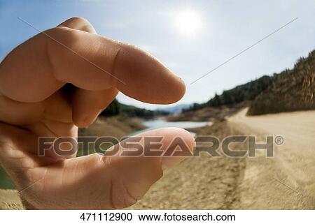 Close-up of a person's hand pretending to hold a lake, Shasta Lake, California, USA View Large Photo Image Stock Image - Close-up of a person's hand pretending to hold a lake, Shasta Lake, California, USA. Fotosearch