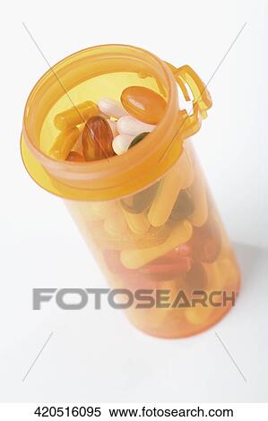 Close-up of a pill bottle full of pills View Large Photo Image Stock Photography - Close-up of a pill bottle full of pills. Fotosearch