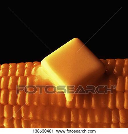 Close-up of a slice of butter melting on a corn View Large Photo Image Stock Image - Close-up of a slice of butter melting on a corn. Fotosearch