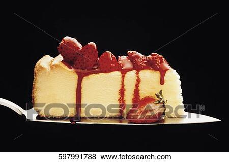Close-up of a slice of strawberry cake on a spatula View Large Photo Image Stock Photo - Close-up of a slice of strawberry cake on a spatula. Fotosearch