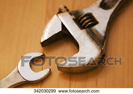Stock Photo - Close-up of a spanner and a wrench. Fotosearch