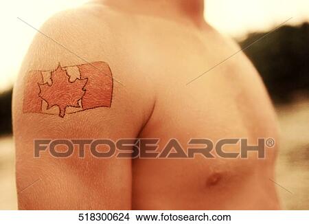 Picture - Close-up of a tattoo on a man's arm. Fotosearch