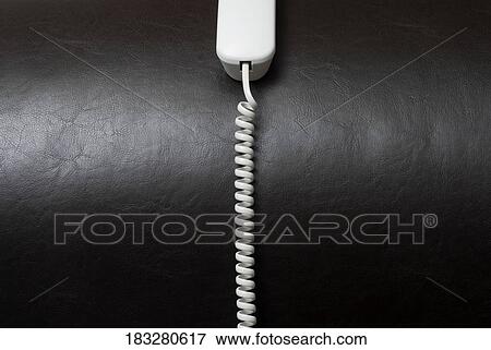 Close-up of a telephone receiver View Large Photo Image Stock Photo - Close-up of a telephone receiver. Fotosearch