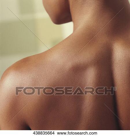 Picture - Close-up of a woman's shoulder. Fotosearch