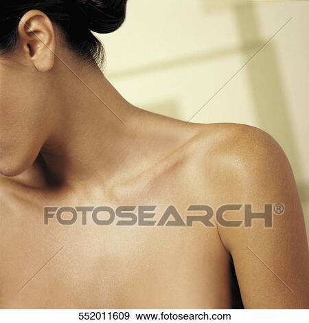 Close-up of a woman's shoulder View Large Photo Image Stock Photo - Close-up of a woman's shoulder. Fotosearch