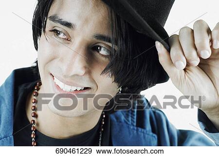 Stock Photo - Close-up of a young man smiling. Fotosearch