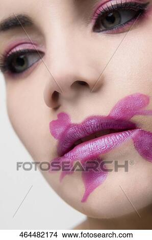 Close-up of a young woman View Large Photo Image Picture - Close-up of a young woman. Fotosearch