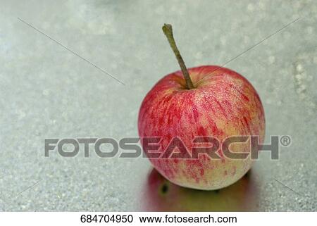 Close-up of an apple View Large Photo Image Stock Image - Close-up of an apple. Fotosearch