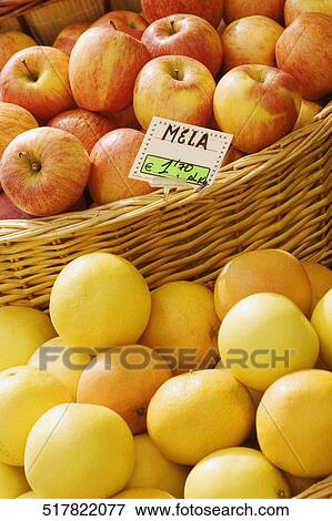 Close-up of apples and bergamots at a market stall, Genoa, Italy View Large Photo Image Stock Photo - Close-up of apples and bergamots at a market stall, Genoa, Italy. Fotosearch