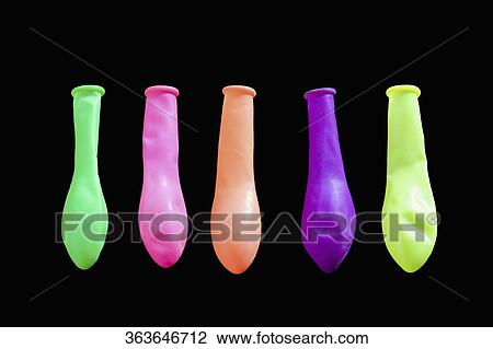 Close-up of balloons in a row View Large Photo Image Stock Image - Close-up of balloons in a row. Fotosearch