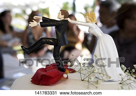 Close-up of bride and groom figurines, Miami, Miami-Dade County, Florida, USA View Large Photo Image Stock Image - Close-up of bride and groom figurines, Miami, Miami-Dade County, Florida, USA. Fotosearch
