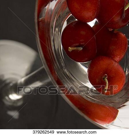 Close-up of cherries in a martini glass View Large Photo Image Stock Photo - Close-up of cherries in a martini glass. Fotosearch