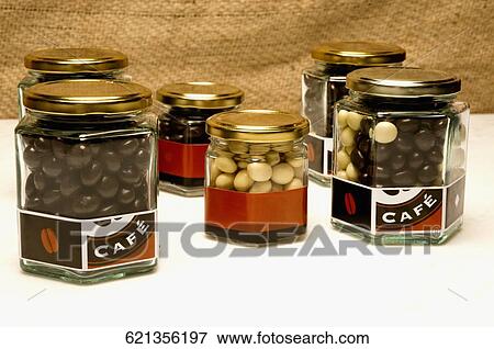 Close-up of coffee beans in jars View Large Photo Image Stock Photo - Close-up of coffee beans in jars. Fotosearch