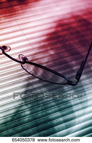 Close-up of eyeglasses View Large Photo Image Stock Photo - Close-up of eyeglasses. Fotosearch