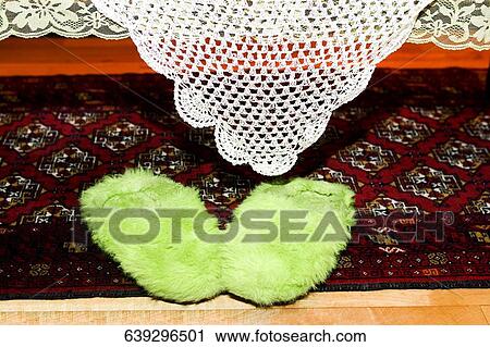 Close-up of fur slippers on a carpet View Large Photo Image Stock Image - Close-up of fur slippers on a carpet. Fotosearch