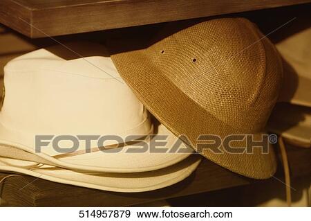 Close-up of hats at a market stall View Large Photo Image Stock Photo - Close-up of hats at a market stall. Fotosearch