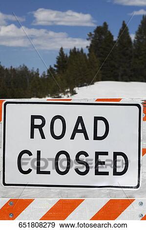Stock Photo - Close-up of road closed sign, Yellowstone National Park, Wyoming, USA. Fotosearch
