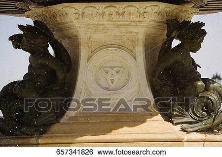 Stock Photograph - Close-up of statues at a fountain, Fontaine Des Trois Graces, Bordeaux, Aquitaine, France. Fotosearch
