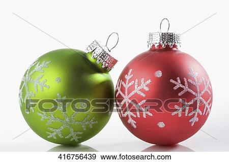 Stock Photo - Close-up of two Christmas ornaments. Fotosearch