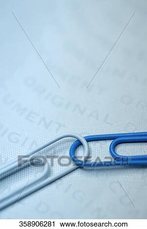 Close-up of two paper clips View Large Photo Image Stock Image - Close-up of two paper clips. Fotosearch