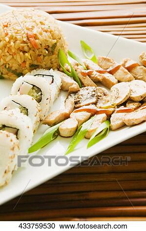 Close-up of various type of sushi food in a tray View Large Photo Image Stock Image - Close-up of various type of sushi food in a tray. Fotosearch