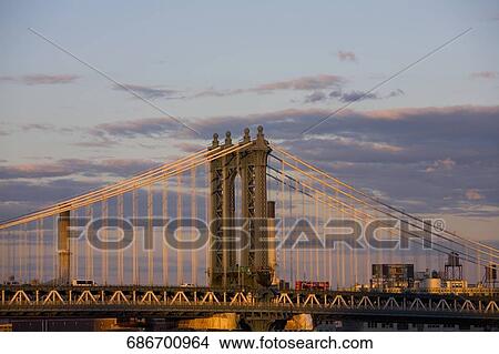 Clouds over a suspension bridge, Manhattan Bridge, Manhattan, New York City, New York State, USA View Large Photo Image Picture - Clouds over a suspension bridge, Manhattan Bridge, Manhattan, New York City, New York State, USA. Fotosearch