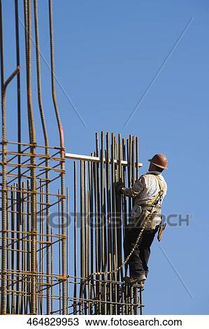 Construction worker at the construction site View Large Photo Image Stock Image - Construction worker at the construction site. Fotosearch