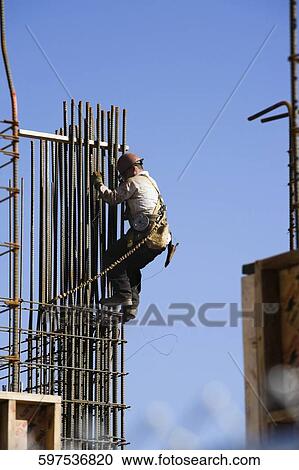 Construction worker at the construction site View Large Photo Image Stock Image - Construction worker at the construction site. Fotosearch