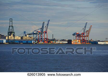 Cranes and cargo containers at a commercial dock, Hudson River, Brooklyn, New York City, New York State, USA View Large Photo Image Stock Photography - Cranes and cargo containers at a commercial dock, Hudson River, Brooklyn, New York City, New York State, USA. Fotosearch