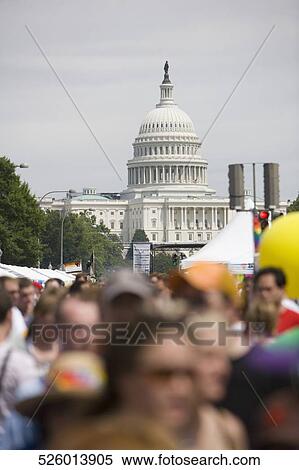 Stock Photography - Crowd in a gay pride parade, Washington DC, USA. Fotosearch