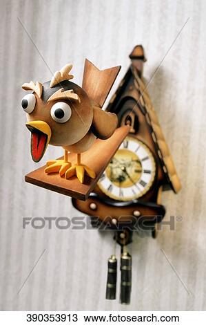 Cuckoo clock on a wall View Large Photo Image Stock Image - Cuckoo clock on a wall. Fotosearch