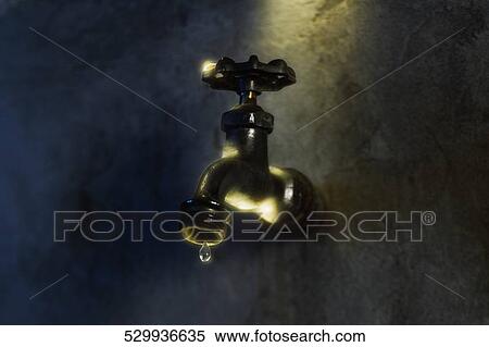 Drop of water falling from a faucet View Large Photo Image Stock Photography - Drop of water falling from a faucet. Fotosearch