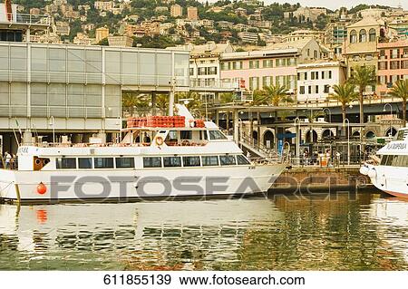 Ferry docked at a port, Porto Antico, Genoa, Liguria, Italy View Large Photo Image Stock Photo - Ferry docked at a port, Porto Antico, Genoa, Liguria, Italy. Fotosearch