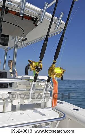 Fishing rods in a speedboat View Large Photo Image Stock Image - Fishing rods in a speedboat. Fotosearch