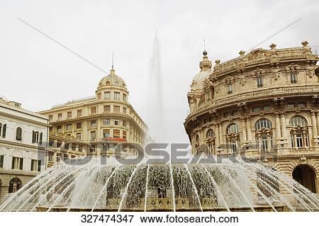 Fountain in front of buildings, Piazza De Ferrari, Palazzo Della Borsa, Museo dell'Accademia Ligustica di Belle Arti, Genoa, Italy View Large Photo Image Stock Photo - Fountain in front of buildings, Piazza De Ferrari, Palazzo Della Borsa, Museo dell'Accademia Ligustica di Belle Arti, Genoa, Italy. Fotosearch